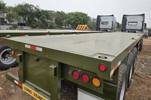 Moóc sàn 40feet CIMC Huajun 12m4 xác nhẹ 7 tấn